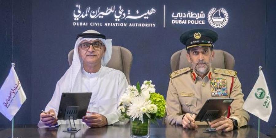مذكرة تفاهم بين «دبي للطيران المدني» و«شرطة دبي» - الأول نيوز